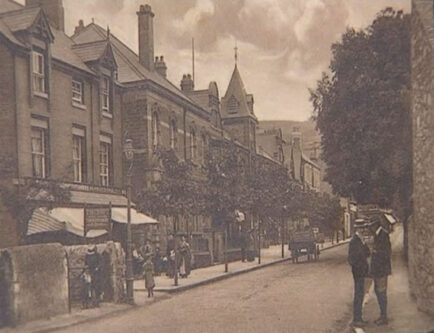 An old photograph of Prestatyn High Street showing the Town Hall (the future location of the Scala Cinema).